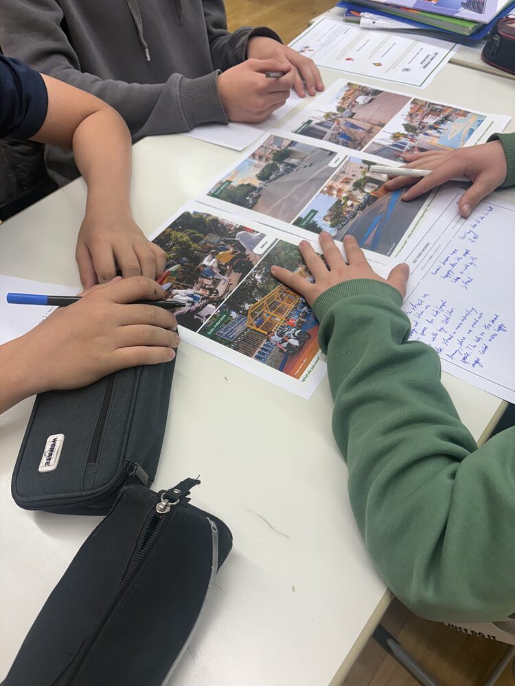Pupils comparing photos of different street types