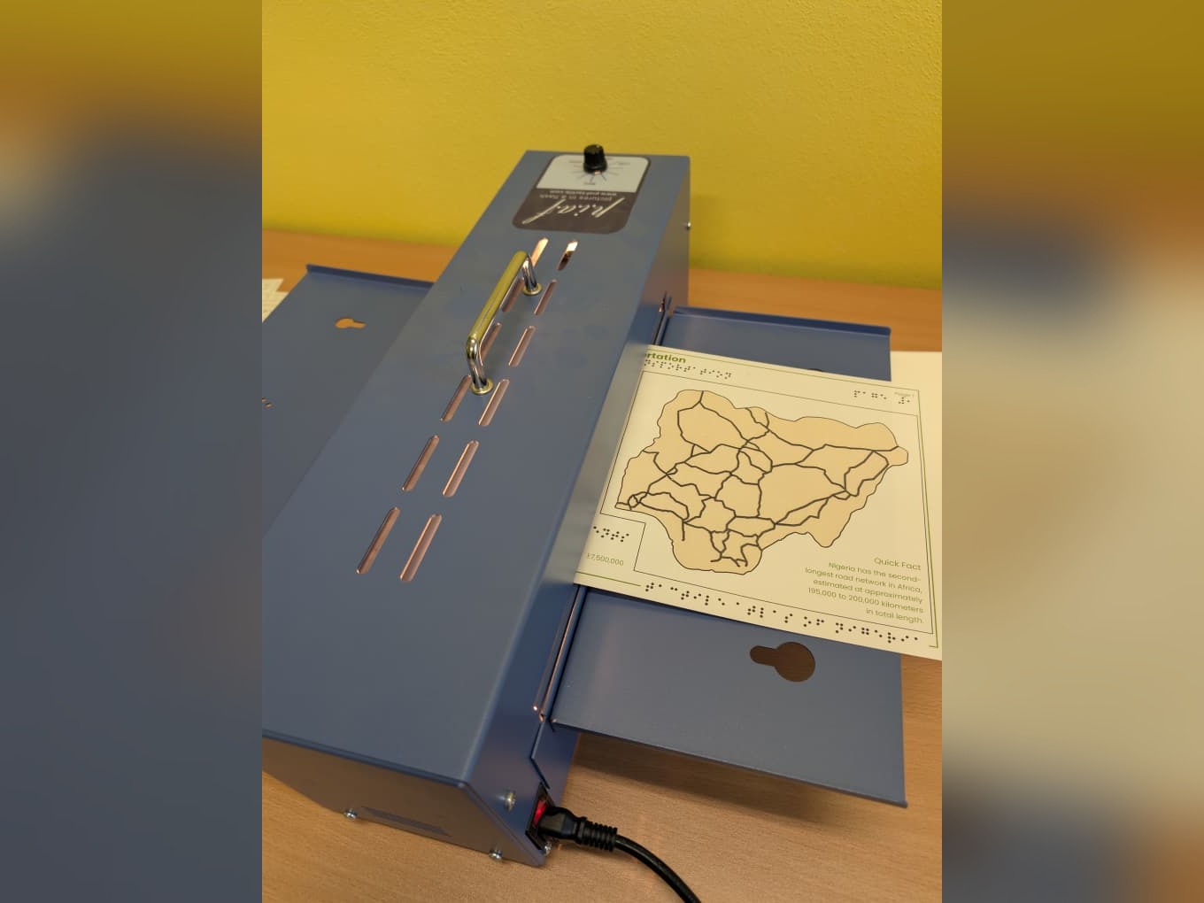 The microcapsule (swell) paper fuser machine used to produce the tactile atlas pages.