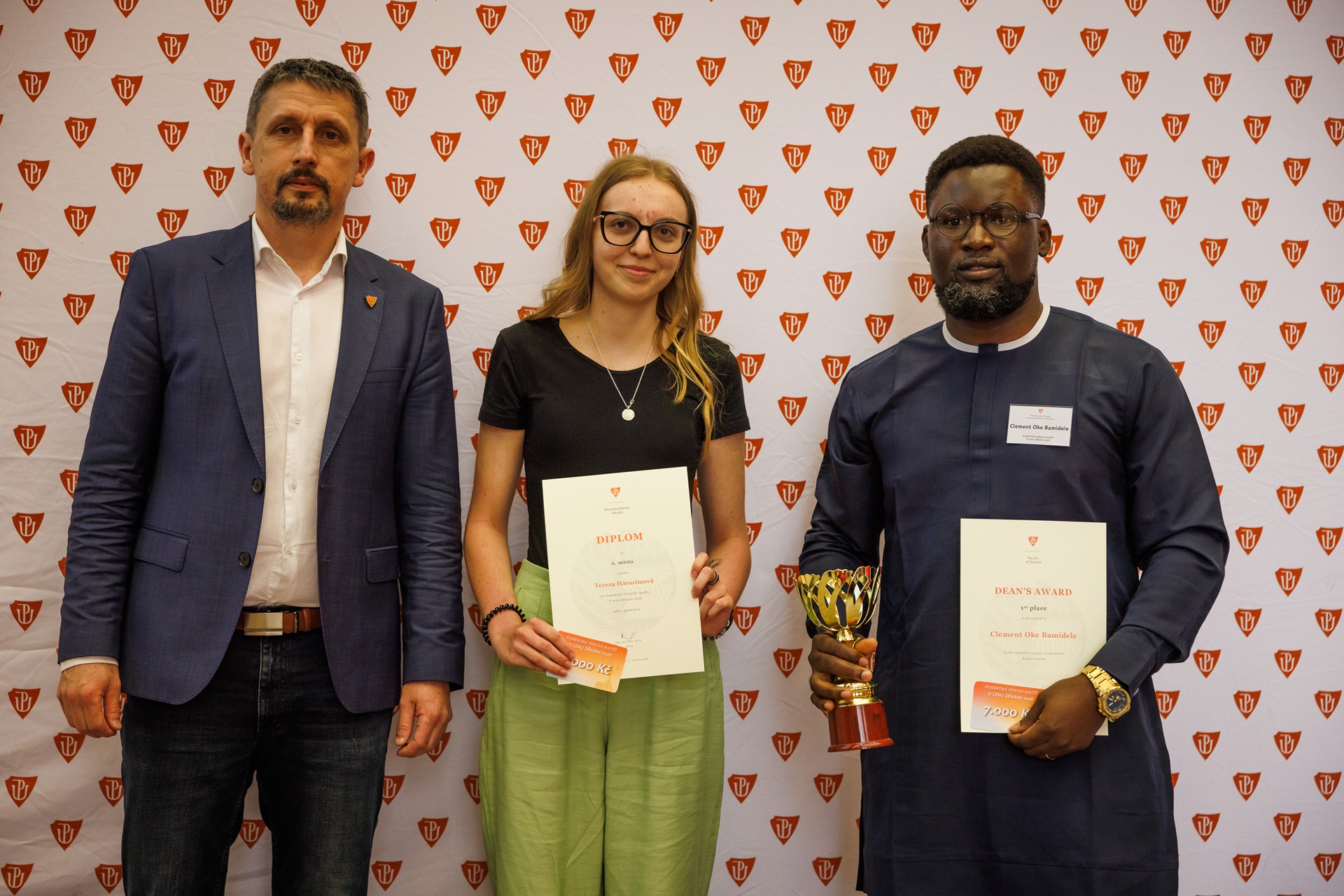 Bamidele Clement Oke receiving the Dean's Award, first place, poster section, Faculty of Science, UPOL.